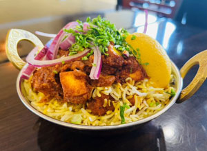 Athidhi Aalayam signature dishes Ghee Karam DosaPachi Mirchi Paneer BiryaniChole Bhature